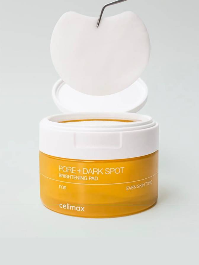 Open jar of Celimax Pore + Dark Spot product on a white background