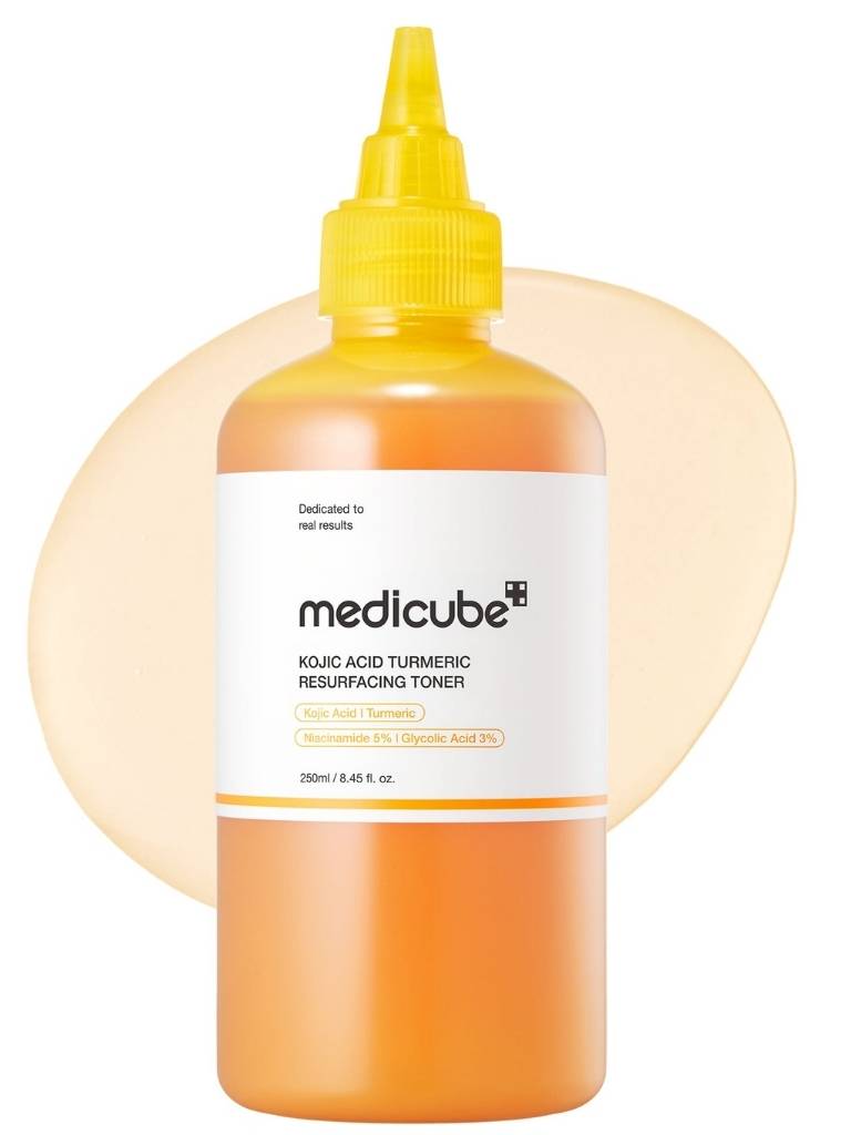 Bottle of Medicube toner with a yellow cap on a white background