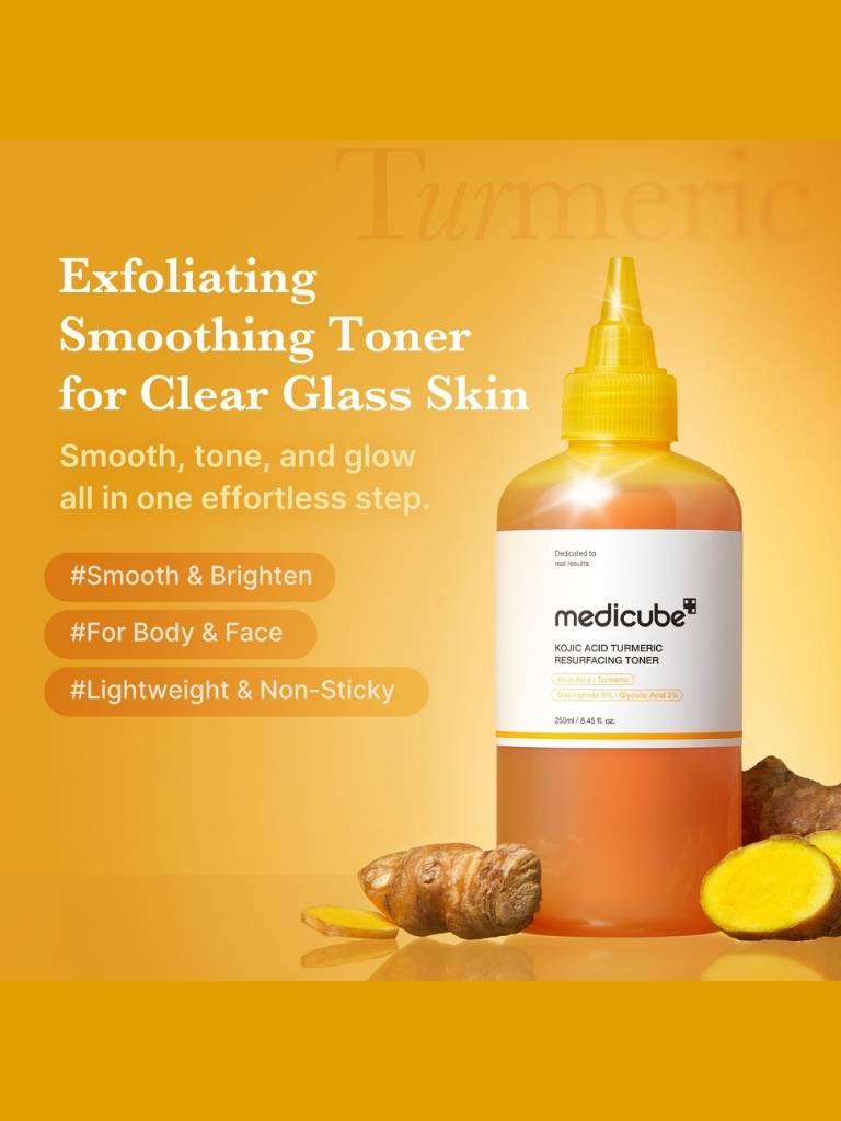 Medicube Exfoliating Smoothing Toner bottle with turmeric root and turmeric powder on a yellow background