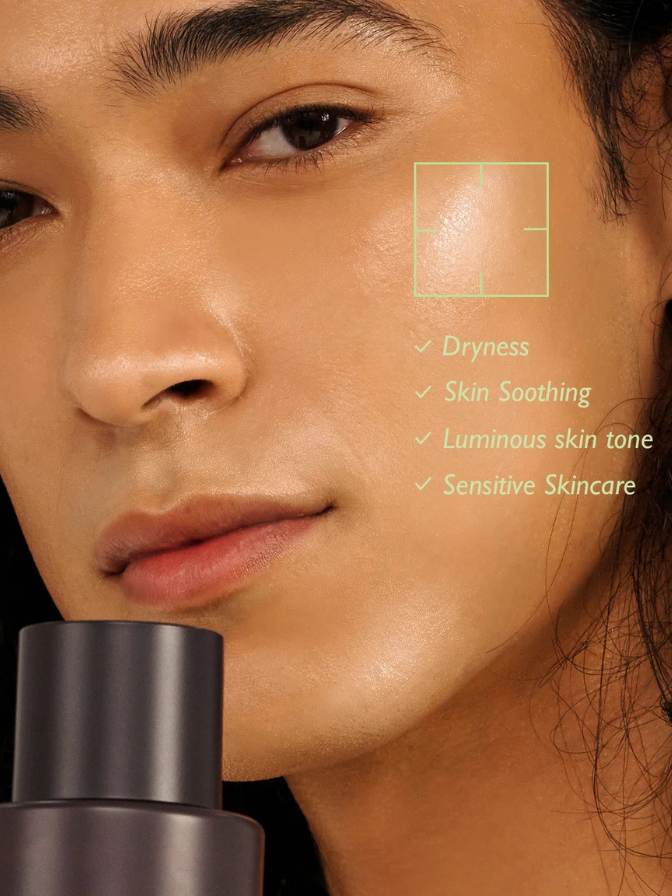Close-up of a person's face with skincare product, highlighting dryness, skin soothing, luminous skin tone, and sensitive skincare benefits.