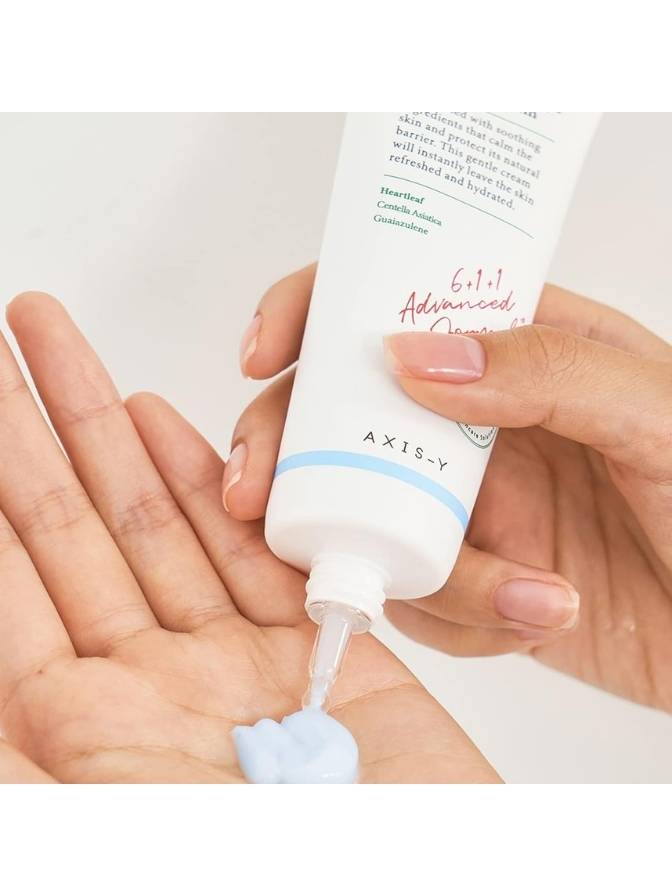 Person applying AXIS-Y skincare product to their hand