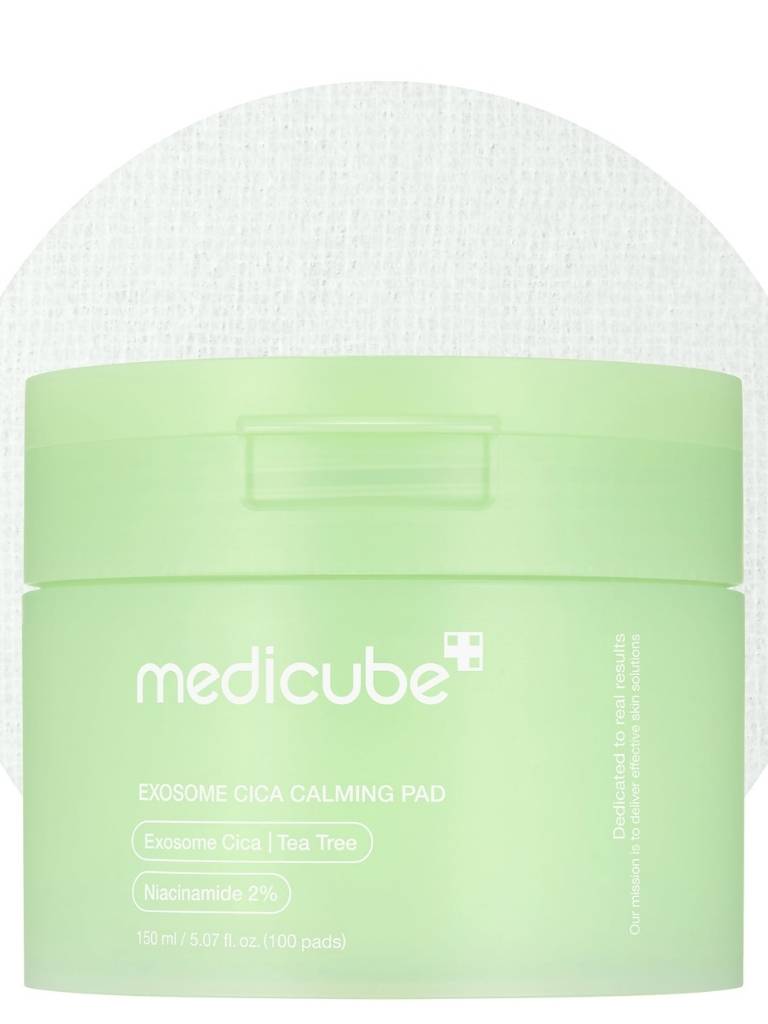 Green jar of Medicube Exosome Lica Calming Pad on a white background