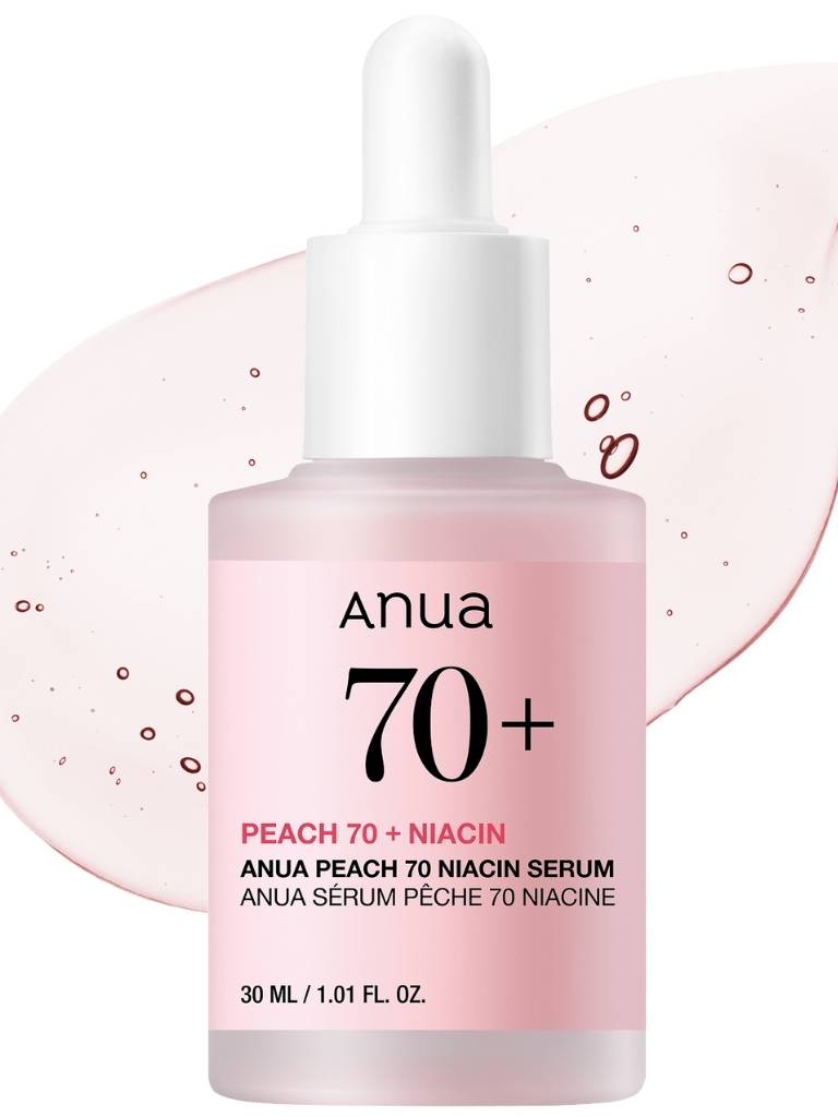 Anua peach 70 + niacin serum bottle on a white background