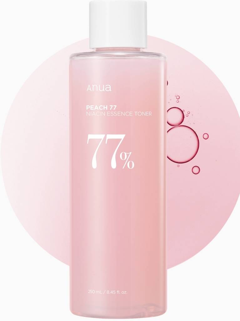 Pink bottle of Ahua Peach 77 Essence Toner with a pink circular design in the background