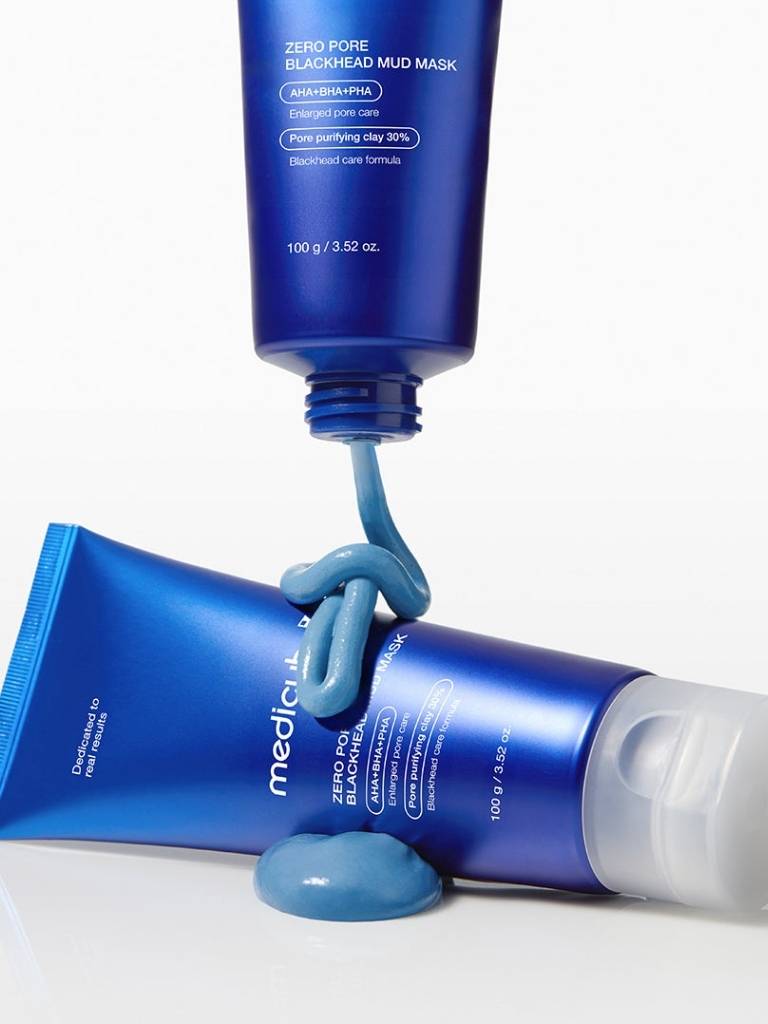 Blue skincare product with a tube on a white background