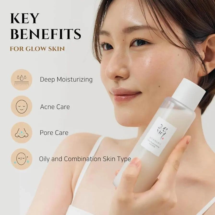Woman holding a skincare product with key benefits listed on a light background