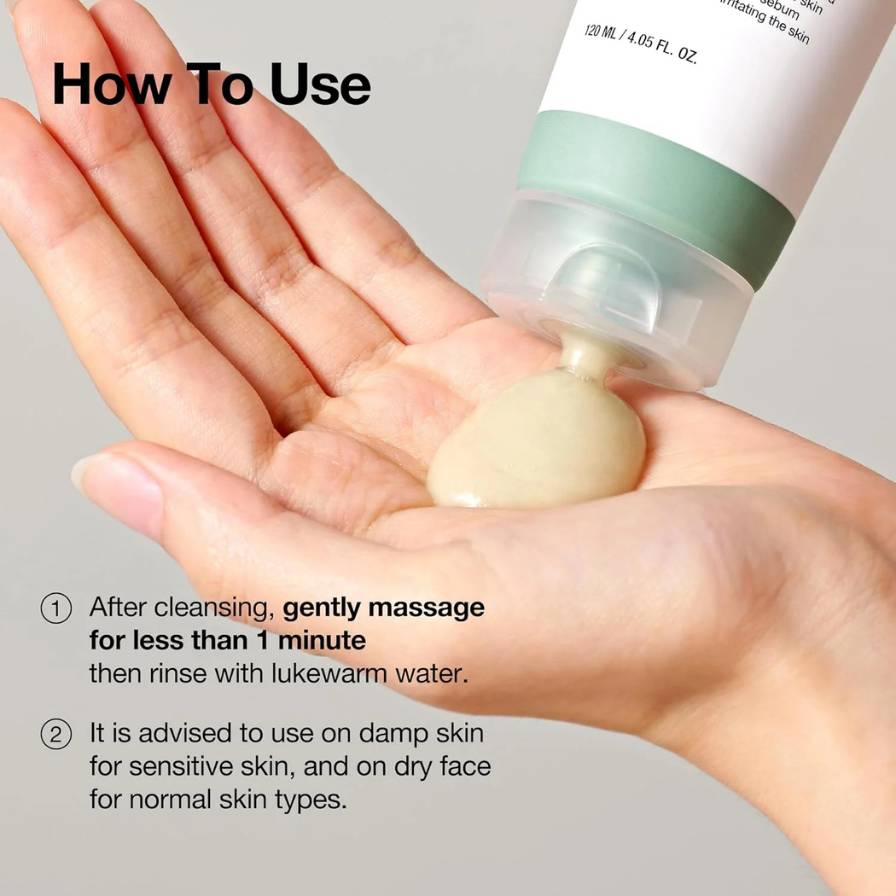 Hand holding a skincare product with instructions on how to use it.