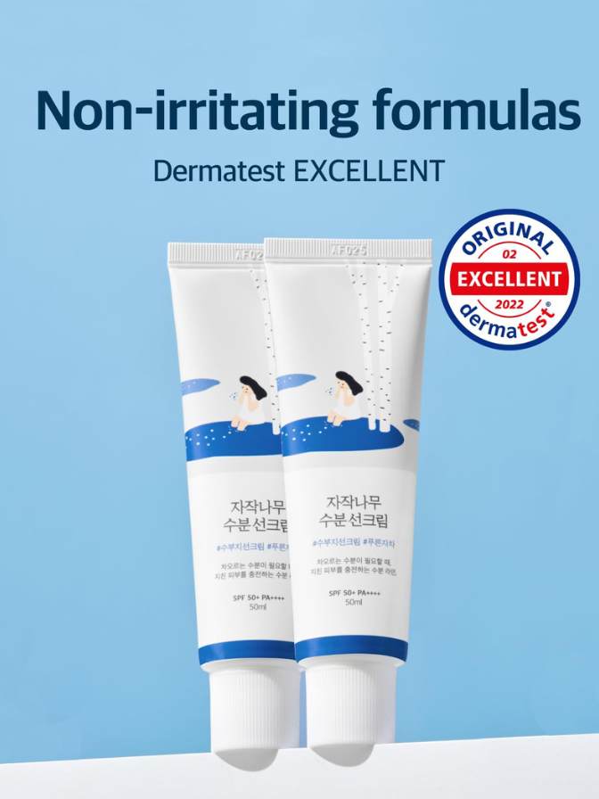 Two tubes of skincare product with 'Dermatest EXCELLENT' certification on a blue background