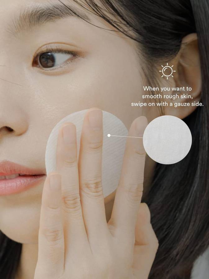 Person using a skincare product on their face with text overlay.