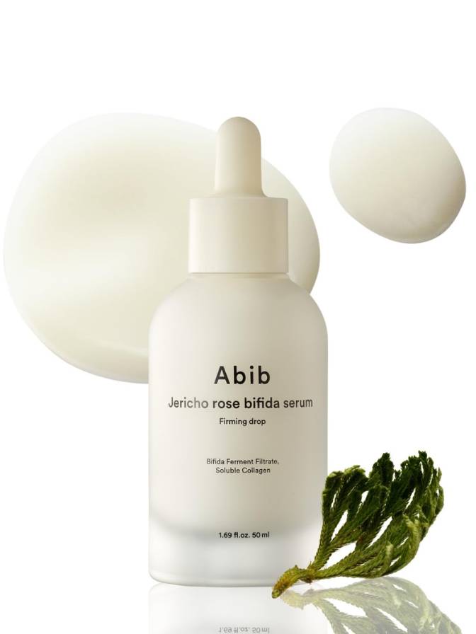 Abib Jericho rose bifida serum bottle with green leaf on a white background
