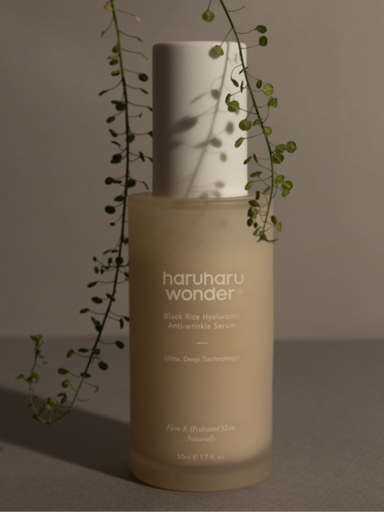 Skincare serum bottle labeled 'haruharu wonder' with a minimal background