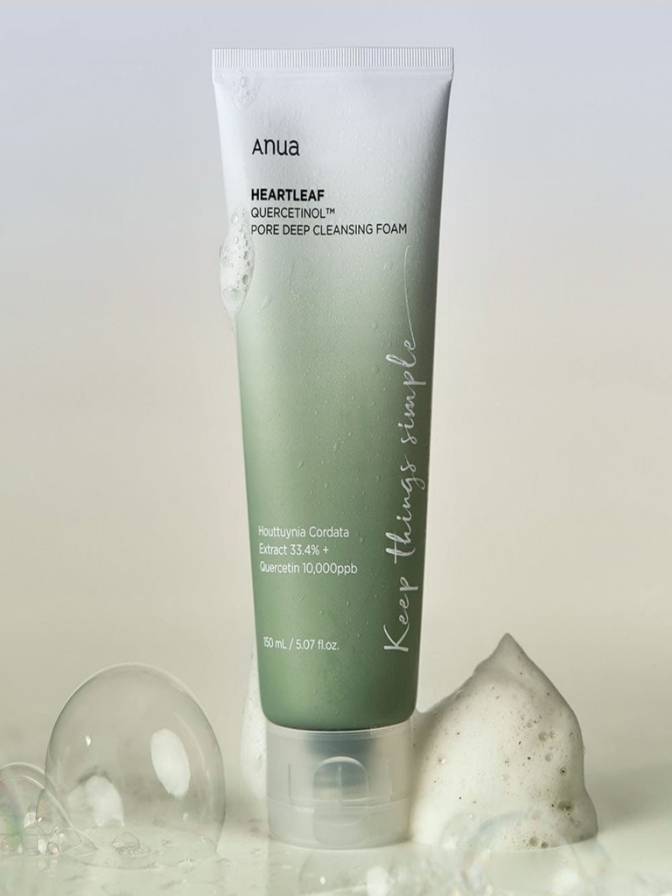 Tube of Anua Heartleaf Quercetinil Pore Deep Cleansing Foam with bubbles on a light background