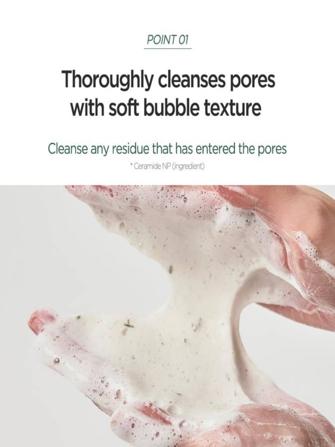 Hand applying a foamy cleanser to skin with text about pore cleansing.
