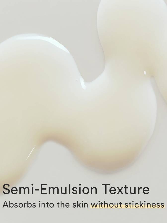 Close-up of semi-emulsion texture with a smooth, creamy appearance on a light background.