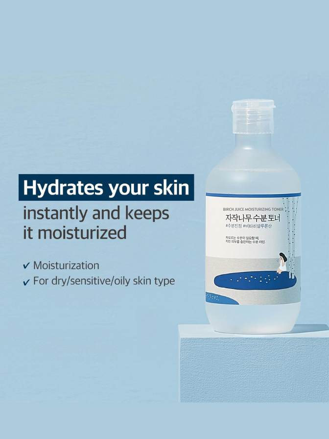 Bottle of skincare product with text on a light blue background