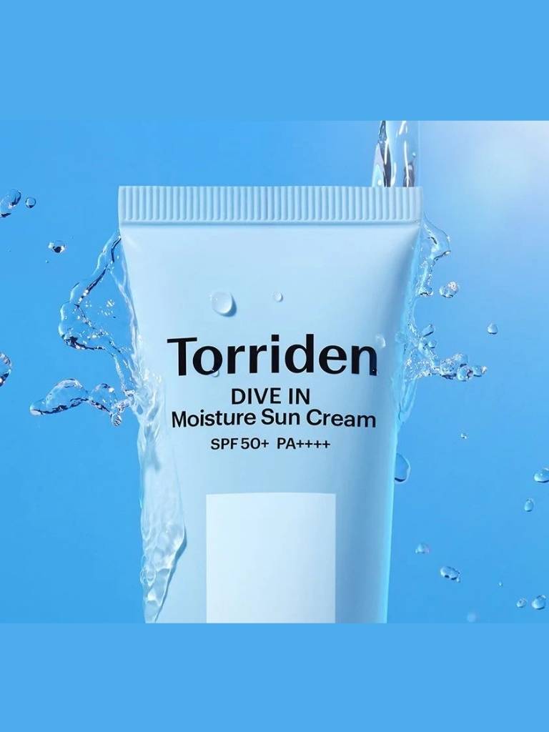 Torriden DIVE IN Moisture Sun Cream tube on a blue background with water splashes