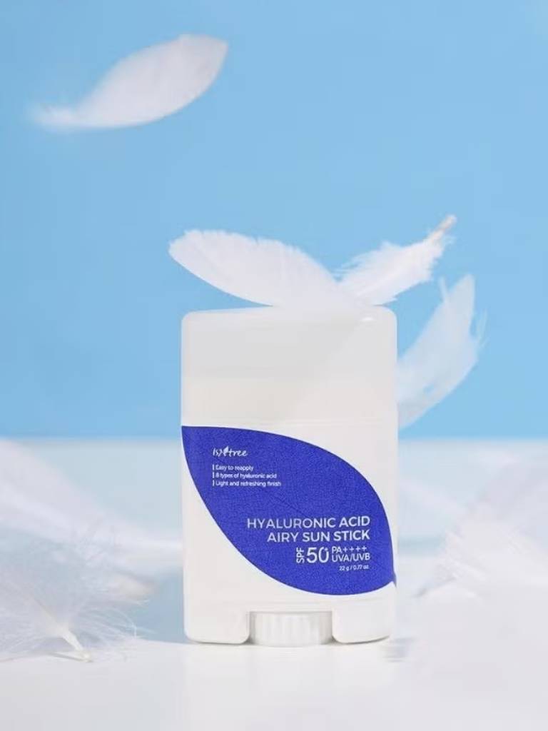 Hyaluronic Acid Airy Sun Stick with blue label on a light blue background