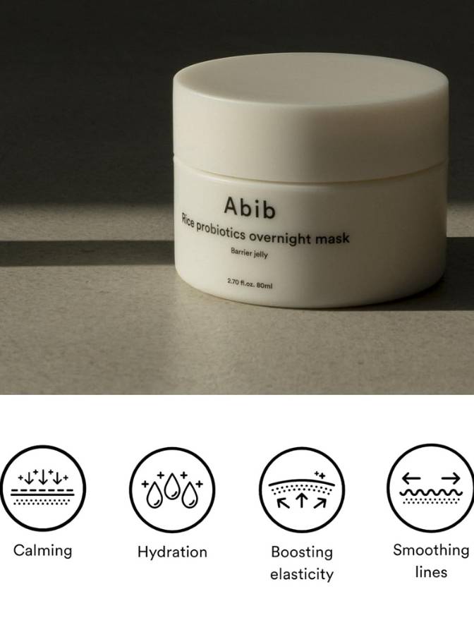 White jar of Abib rice probiotics overnight mask on a dark background with icons below.
