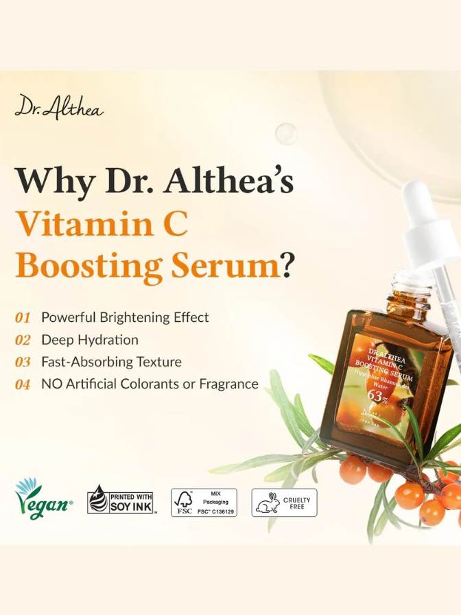 Dr. Althea Vitamin C Boosting Serum advertisement with serum bottle and berries on a light background