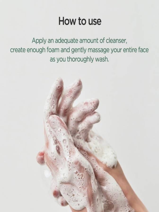 Hands with soap suds and text on how to use cleanser