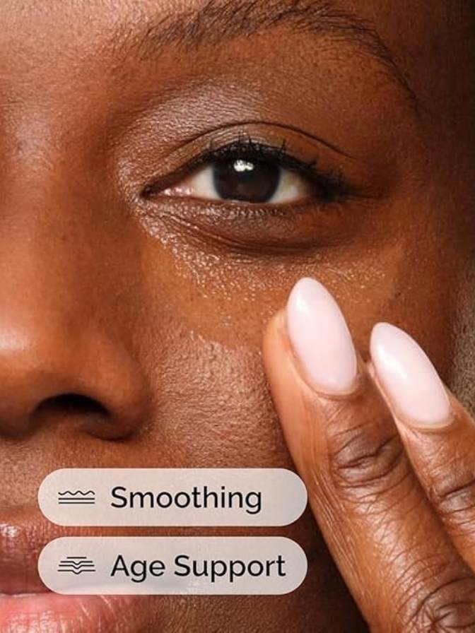 Close-up of a woman's face with a finger pointing to her skin, labeled 'Smoothing' and 'Age Support'.