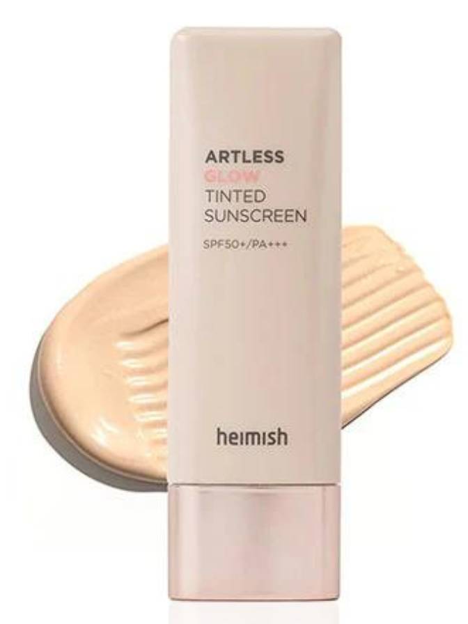 Artless Tinted Sunscreen bottle with a swatch on a white background