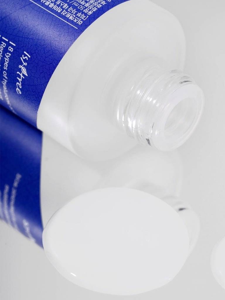 Two bottles of Isagenix products on a white background