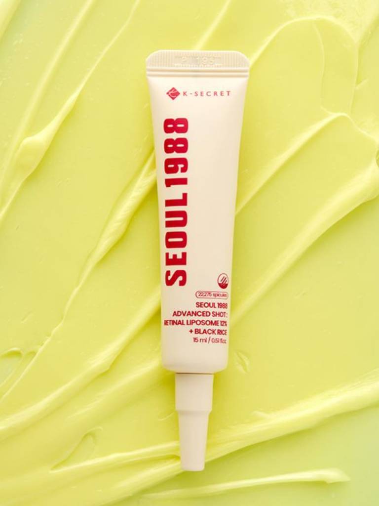 K-SECRET Seoul 1988 skincare tube on a yellow textured background