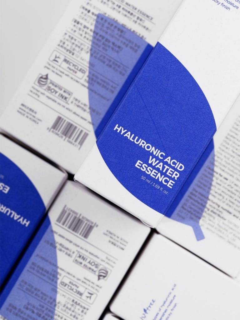 Packaging of Hyaluronic Acid Water Essence with blue and white design.