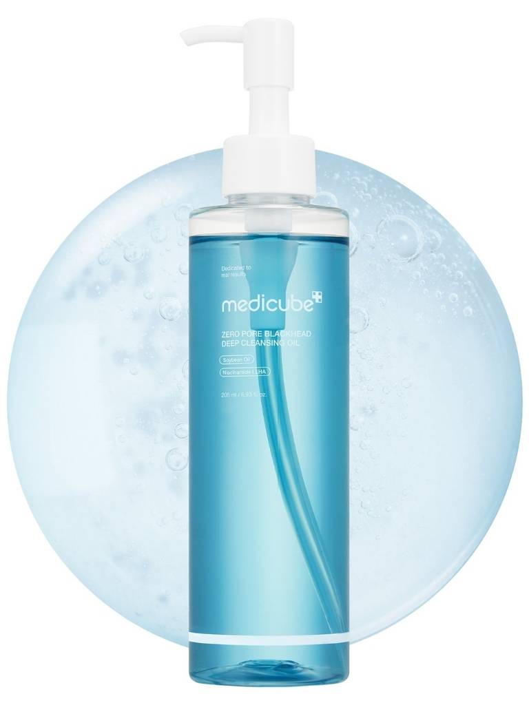 Blue bottle with pump dispenser on a white background