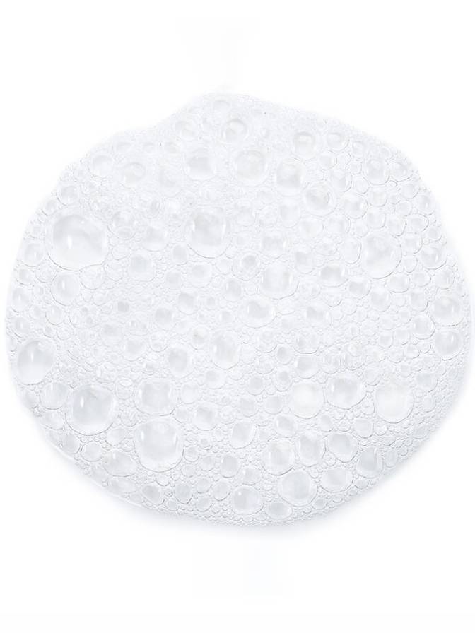 Round white lace doily on a white background
