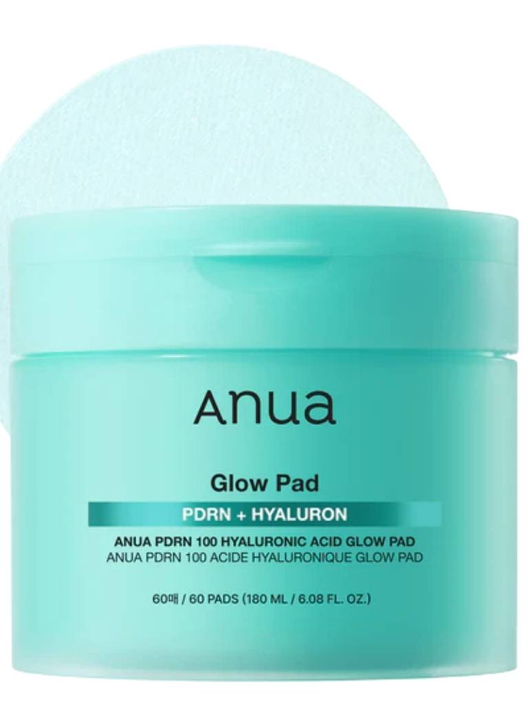 Anua glow pad container with a white background