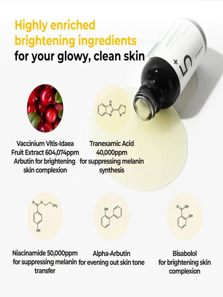 Cosmetic bottle with ingredients for skin brightening on a white background