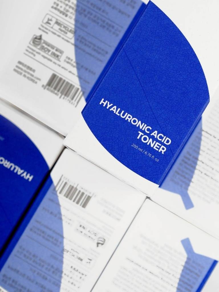 Blue packaging of Hyaluronic Acid Toner on a white background