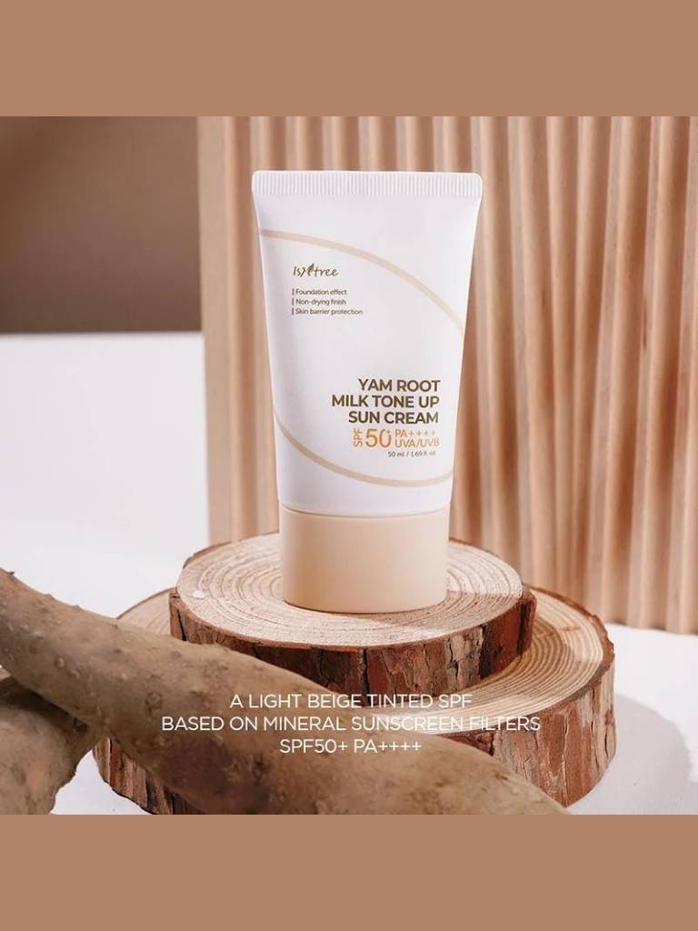 Sun cream tube on a wooden stand with a beige curtain background