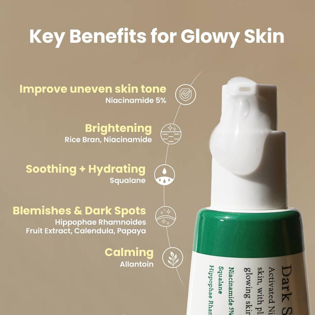 “Flat lay of AXIS-Y Dark Spot Correcting Glow Serum with skincare accessories – radiance boosting serum”
