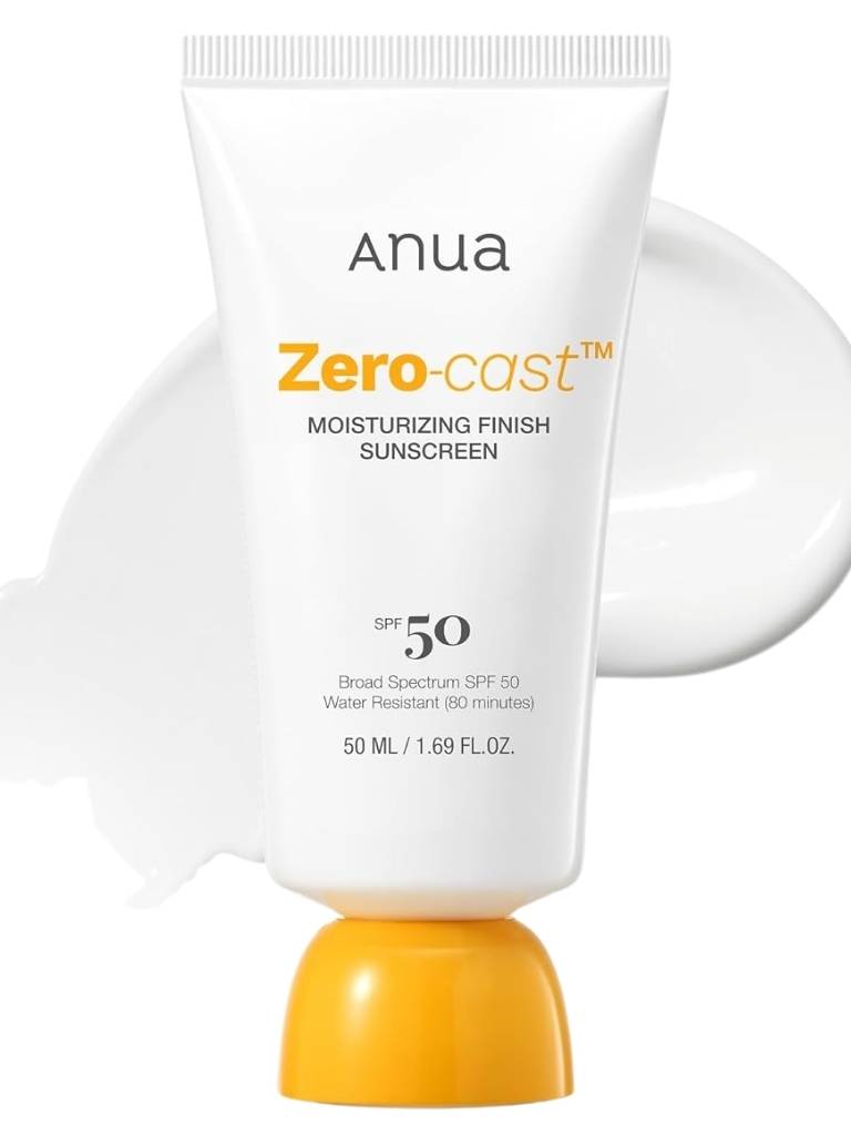 Anua Zero-cast sunscreen tube with white cap and orange base on a white background
