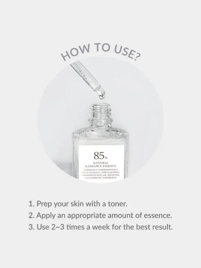 Skincare bottle with dropper and usage instructions on a light gray background