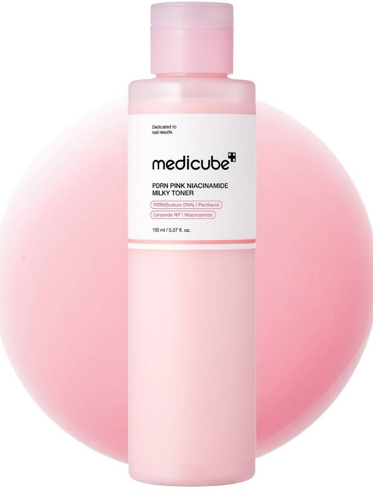 Medicube pink milk toner bottle with pink background