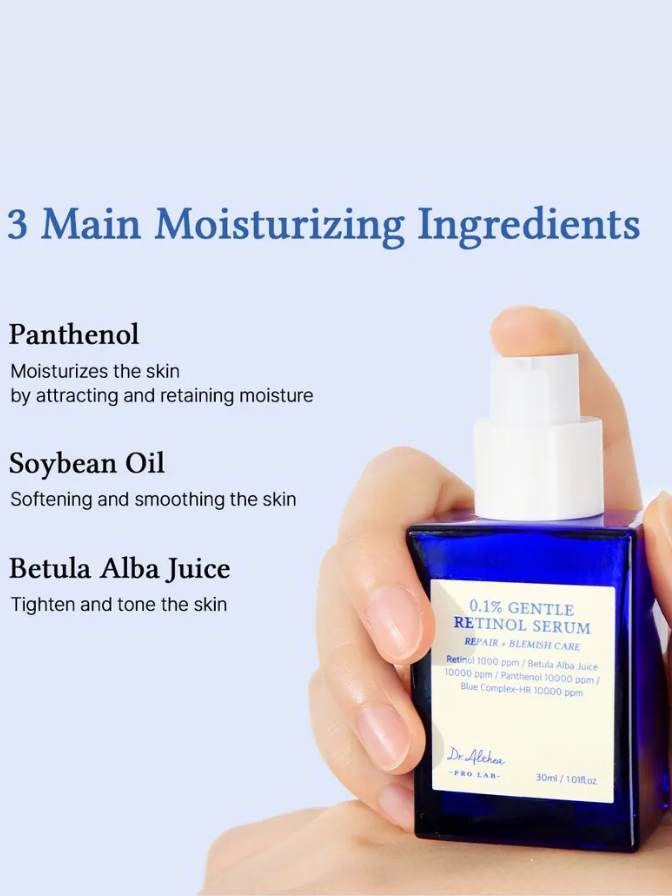Hand holding a blue skincare serum bottle with text on moisturizing ingredients.