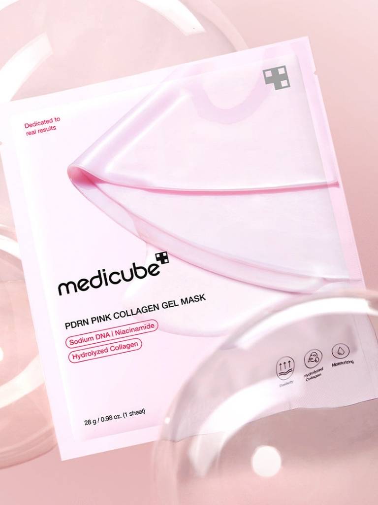 Pink collagen gel mask packaging with Medicube branding on a pink background