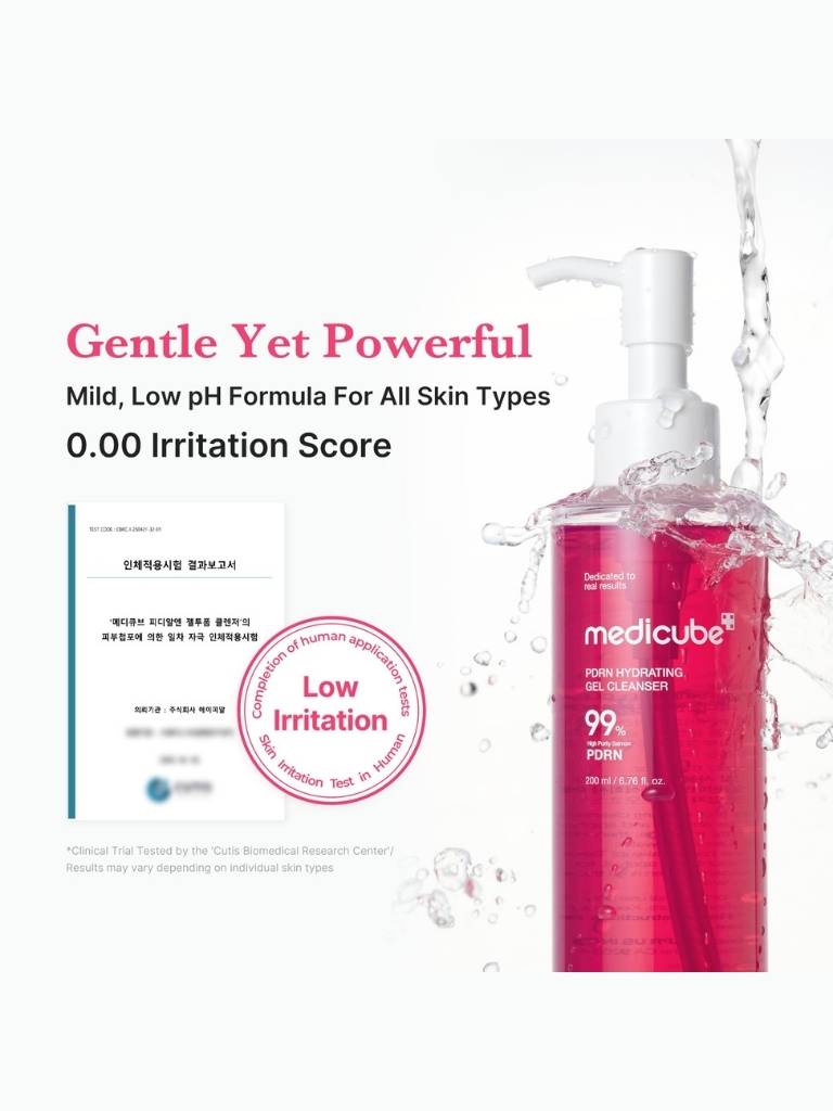Medicube cleanser bottle with water splash on a white background