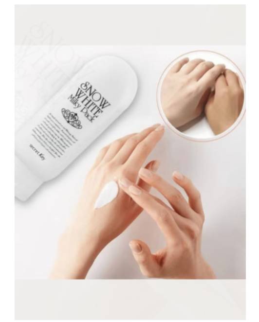 Hand cream with a close-up of hands applying it on a white background