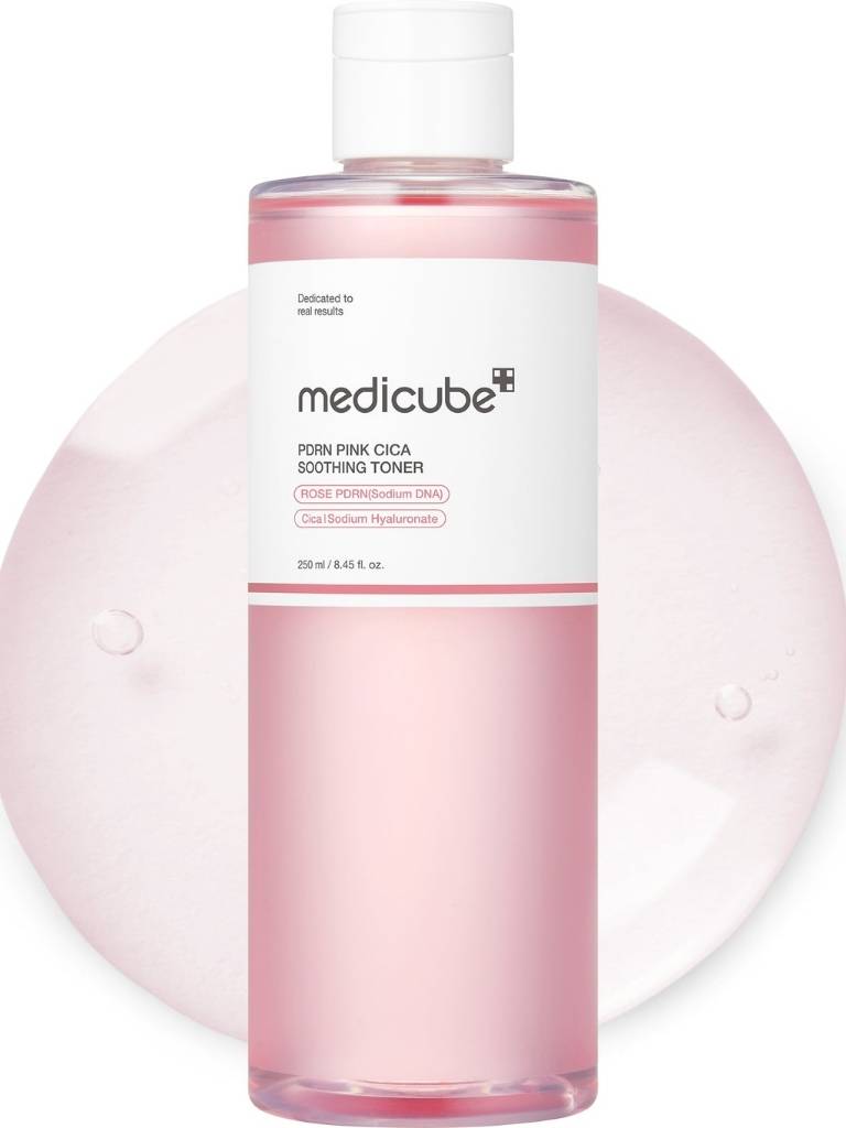Medicube pink toner bottle on a white background