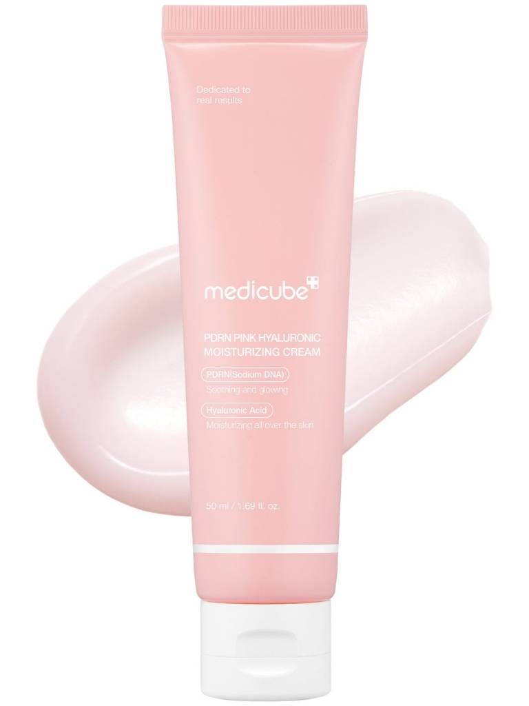Pink tube of Medicube cream on a white background