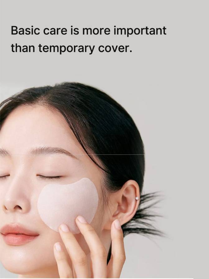 Woman applying a patch to her face with text 'Basic care is more important than temporary cover.'