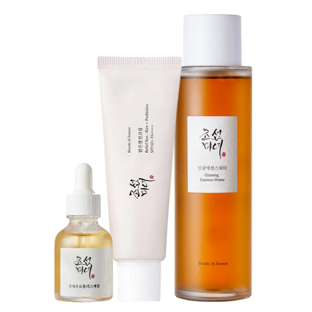 Set of BEAUTY OF JOSEON skincare products with white and orange bottles on a white background